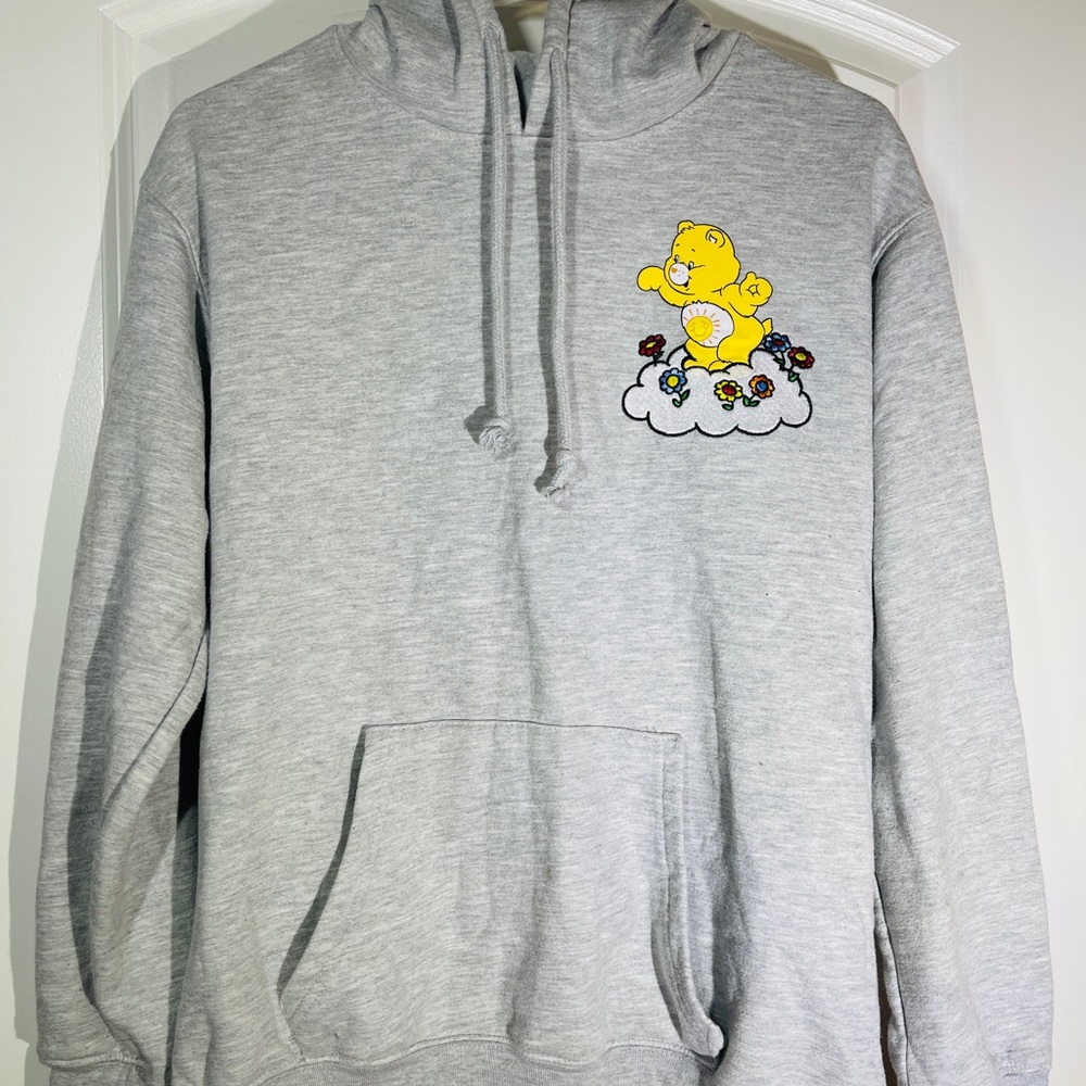 Care Bears Light Gray Hoodie with Yellow Bear Design